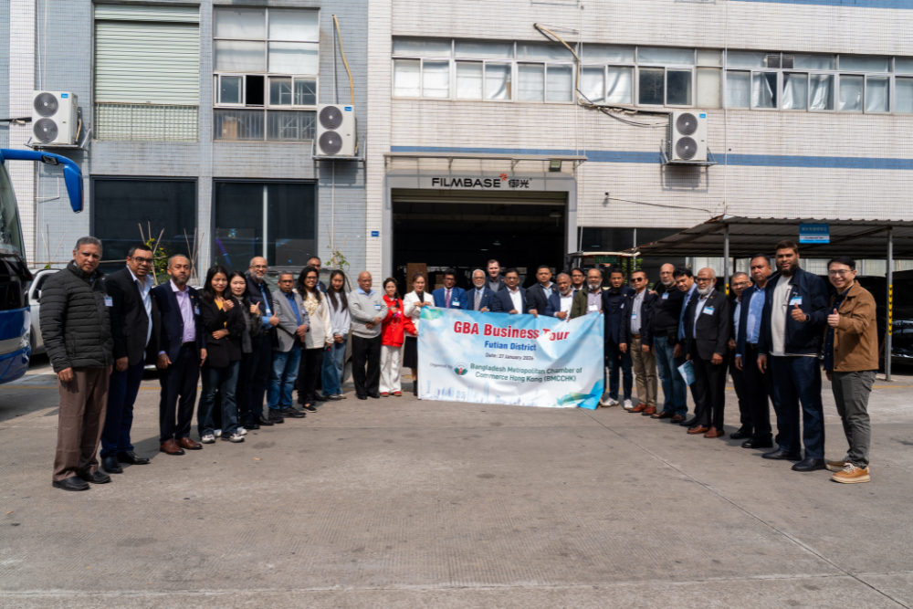 Group photo after the factory tour.png
